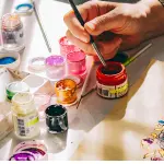 Icône Personnalisation avec pinceau et pots de peinture colorés – Fil Dé Toile