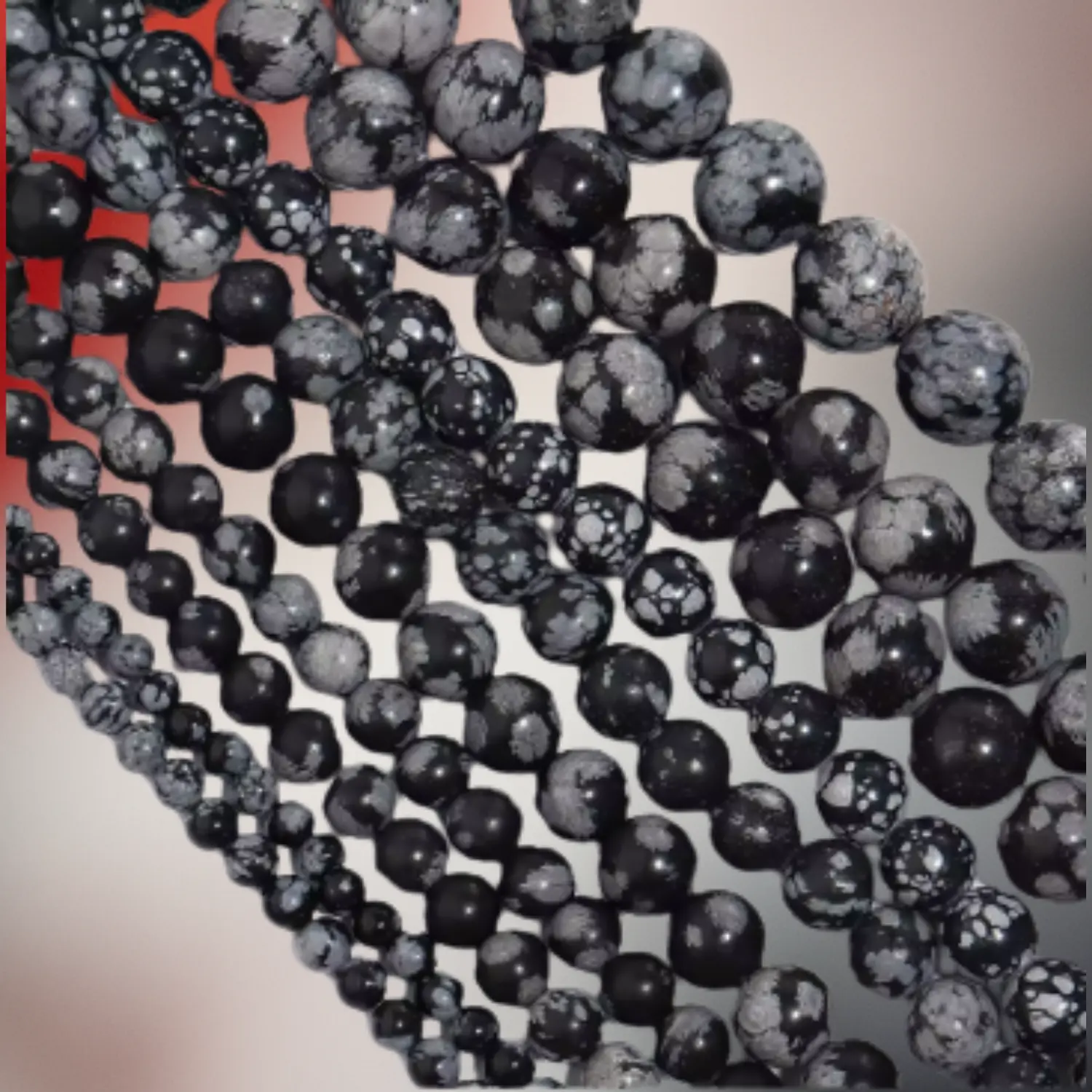 Perles d’obsidienne neige noire mouchetée de gris, utilisées pour des bijoux en macramé artisanaux Fil Dé Toile